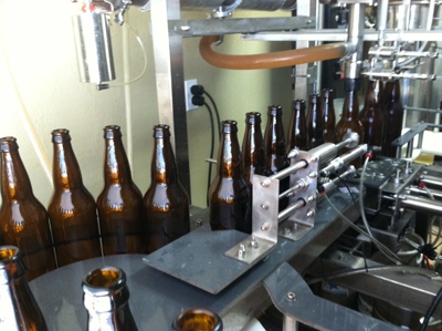 22-Ounce Bombers of Cocoa Beach Pale Ale being bottled.
